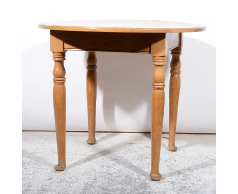 Light oak breakfast table, circular top, turned legs, diameter 91cm.