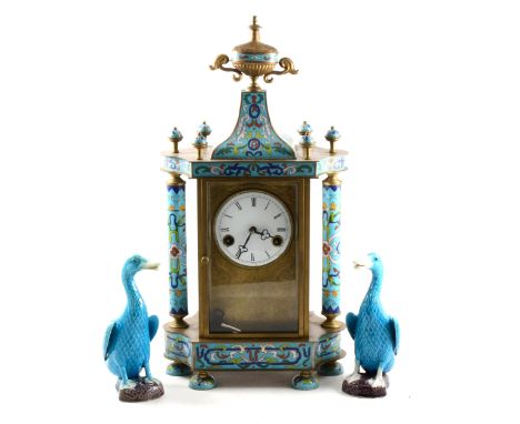 A brass and enamel shelf clock with pagoda top and free standing pillars, white enamelled dial with Roan numerals, 52cm; toge