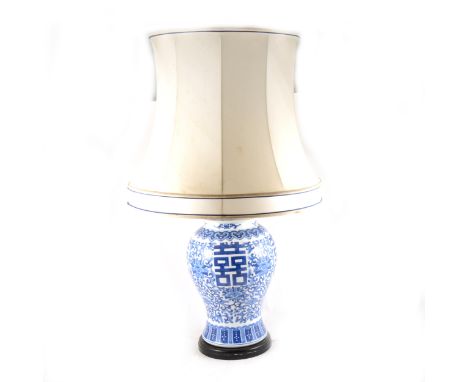 Modern Chinese vase and cover, blue and white motifs, converted to a table lamp, wooden base, 53cm inc fittings.