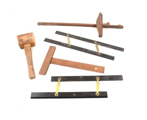 Small quantity of woodworking tools and set squares.