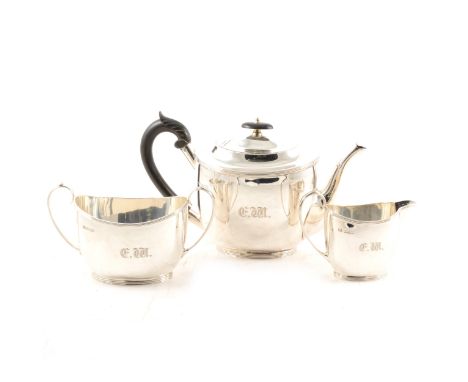 Three-piece oval silver tea set, by Atkin Brothers, Sheffield 1917, oval tapering form with reeded outlines, engraved initial