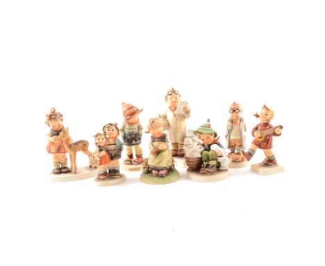 Hummel pottery lamp and figures.