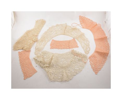 A tray of antique and vintage lace, collars, panels, edging, cream, white, black and peach.