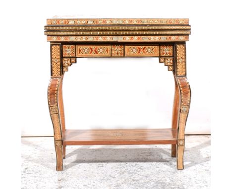 Anglo Indian games table, rectangular foldover top, cabriole legs joined by a shelf, profusely inlaid, width 61cm, depth 31cm