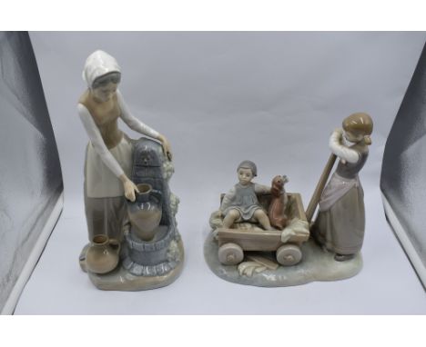 A Lladro study, The Cart, Girl with Cart holding boy and dog, model no 1245 and a Nao study, Girl with Pails