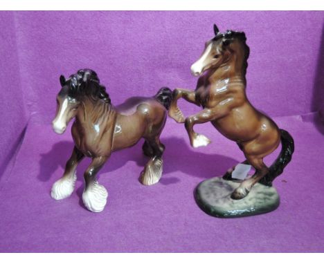 Two Beswick Studies, Welsh Cob Rearing, brown, first version 1014 and Cantering Shire, brown 975