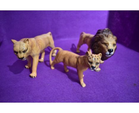 A first version set of figure studies the Lion Family by Beswick, Lion 1506, Lioness 1507 and Lion cub 1508 having restoratio