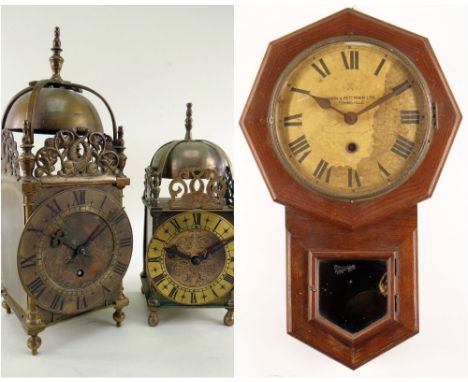 TWO BRASS REPRODUCTION LANTERN CLOCKS, smaller marked 'Smiths Clocks &amp; Watches Ltd', and with electric movement, 25cms hi