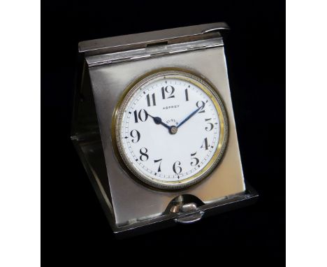 GEORGE V ASPREY SILVER TRAVELLING WATCH, Chester 1913, engine turned folding case with 8-day nickel lever pocket watch, 9 x 7