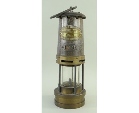 E. THOMAS &amp; WILLIAMS LTD. MINER'S SAFETY LAMP, No. B/136, type no. , 27cms high