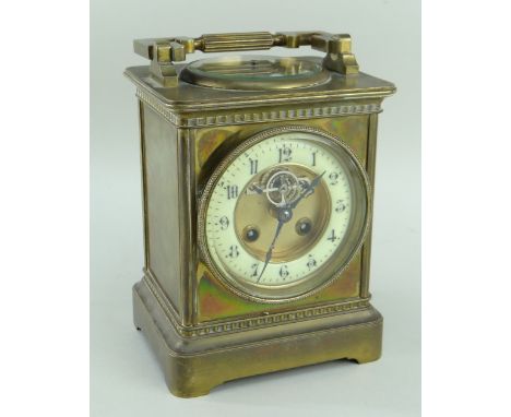 FRENCH BRASS COMBINATION MANTEL CLOCK in the form of an oversized carriage clock, the swing handle above an inset aneroid bar