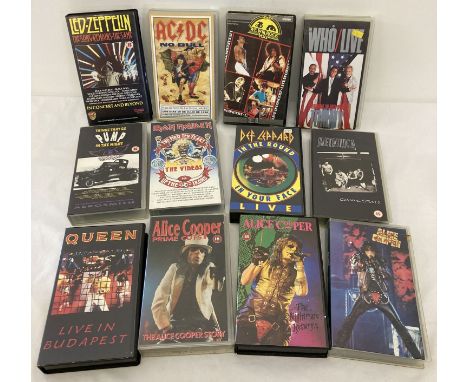 A collection of vintage hard rock VHS tapes.  To include: Alice Cooper, AC/DC, Metallica, Led Zeppelin and Queen. 