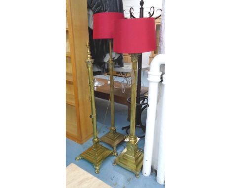 STANDARD LAMP, Corinthian column style in brass with shade, 160cm H plus another similar pair, one without shade, 167cm H. (3