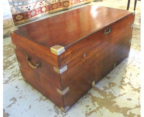 TRUNK, 19th century camphorwood and brass bound with rising lid and carrying handles, 114cm x 68cm x 55cm H.