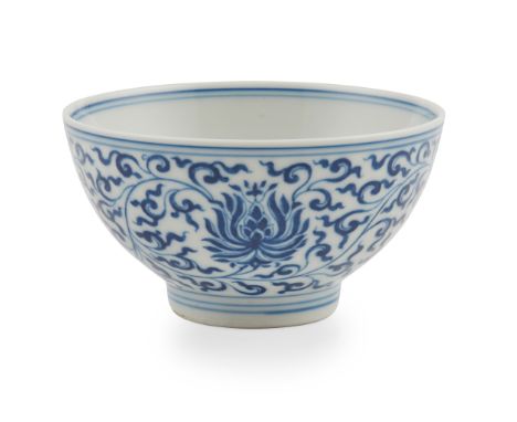 BLUE AND WHITE 'LOTUS' BOWL KANGXI MARK AND POSSIBLY OF THE PERIOD 康熙款或到代 青花蓮紋碗 the deep rounded sides painted with lotus in 