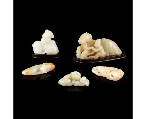 GROUP OF FIVE ZOOMORPHIC JADE CARVINGS 各色瑞獸玉雕（一組五件） comprising: the largest, a celadon jade ornament of a recumbent horse and