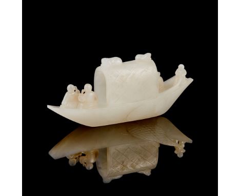 WHITE JADE CARVING OF A SAMPAN QING DYNASTY, 19TH CENTURY 清 白玉雕舟楫擺件 finely carved with two seated figures on front end, the o