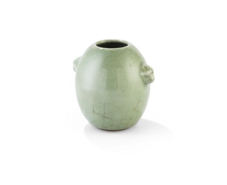 CELADON-GLAZED DRUM-SHAPED JAR QING DYNASTY, 18TH-19TH CENTURY 清 粉青釉羊首鼓式罐 in imitation of a drum, the vase moulded with two g