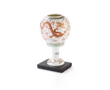 FAMILLE ROSE 'DRAGON AND PHOENIX' VASE QING DYNASTY, 19TH CENTURY 清 粉彩龍鳳紋瓶 （後改為燈罩） the vase supported on a tall splayed foot,