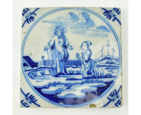 A late 18th century Dutch blue and white Delftware ceramic tile, featuring an ecclesiastical religious scene. The Delft tile 
