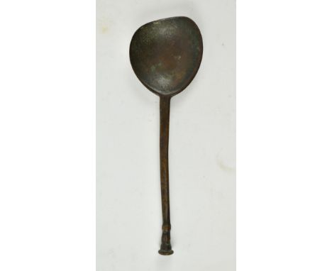 A 16th / early 17th century bronze seal top spoon. The spoon with worn seal top &amp; rat tail design to underside of bowl. W