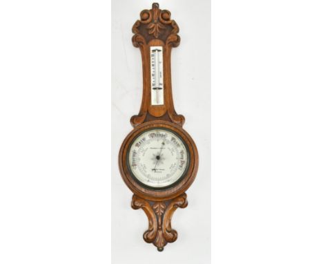 Pastorelli &amp; Rapkin - a late 19th century Victorian wall hanging walnut aneroid barometer. The barometer reading to base 