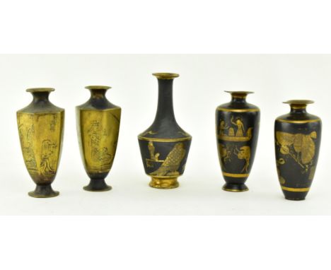 Five early 20th century lacquered brass, copper and bronze miniature Japanese / Egyptian vases, the lot comprising a pair, a 