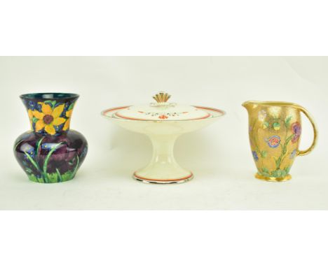 A collection of three early 20th century &amp; later decorative ceramic centrepieces. The lot comprising a 1930s Art Deco lid