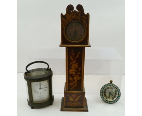 A GLASS BALL TYPE BOUDOIR CLOCK, decoratively framed, 7cm diameter, together with a decorative WATCH STAND of longcase clock 