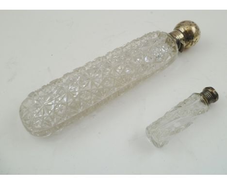 JOSEPH GLOSTER & SONS A VICTORIAN CUT LEAD CRYSTAL SCENT BOTTLE of long rectangular form with all-over deep cut geometric dec