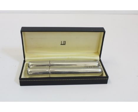 A Dunhill pewter combined cigar case and hip flask, in original box, 18cm long