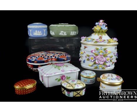 Nine various porcelain and enamel boxes including Halcyon Days 'Just to say'; 'I love you'; Wedgewood jasper; a modern flower