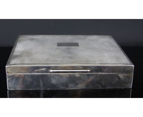 A silver cigarette box, rectangular form with engine turning to top and vacant reserve, makers mark for H.Bros