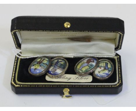 Golfing interest - A pair of 925 stamped silver and enamel golfing cufflinks, each with polychrome golfer figure, in fitted b