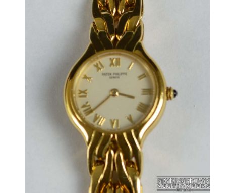 Patek Philippe 'La Flamme' - An 18ct yellow gold ladies bracelet wrist watch in near mint condition, model number 4816/1 with