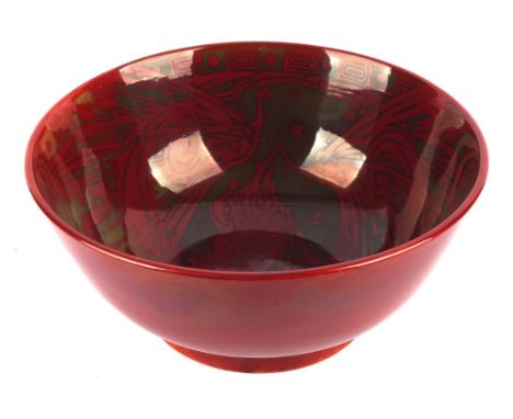 R R TOMLINSON for BERNARD MOORE, a large pottery bowl decorated with a dragon, on a smoked ground, in a flambé red glaze, Ber