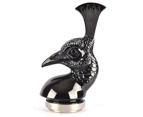 LALIQUE, a peacock black oxide car mascot, on a metal circular stand, engraved 'Lalique (R) France', 18 cm including stand, w