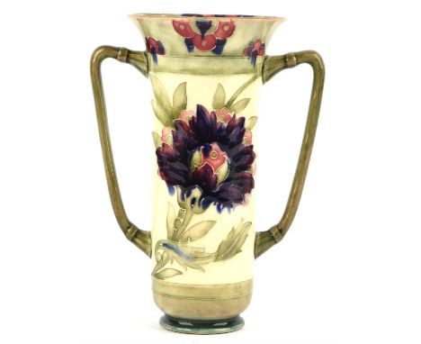 WILLIAM MOORCROFT (1872-1945), a Persian pattern twin-handled ceramic vase c.1920, signed in green W Moorcroft, impressed Moo