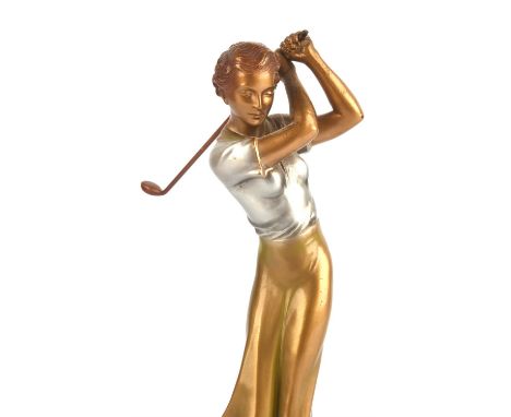ART DECO SCHOOL, a spelter figure of a lady golfer, patinated in gold and silver lacquer, on an onyx plinth, 28cm highConditi
