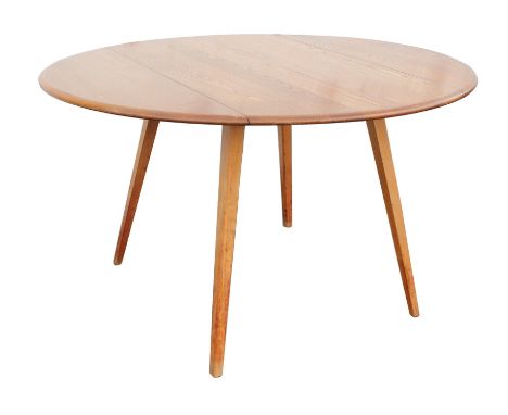 ERCOL,  set of six elm and beechwood chairs and a drop leaf table, the top on splayed tapered legs, the chairs with tapered s