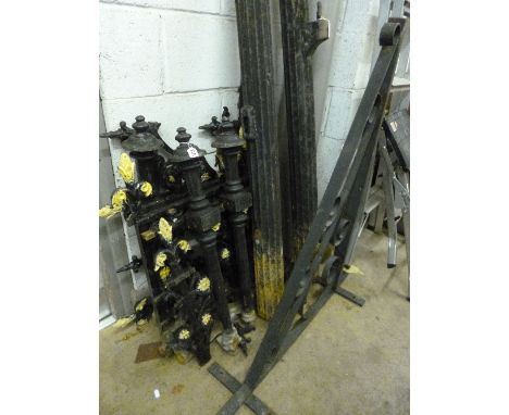 A QUANTITY OF DISMANTLED PAINTED CAST IRON BALLESTRADES, and a wall hanging bracket