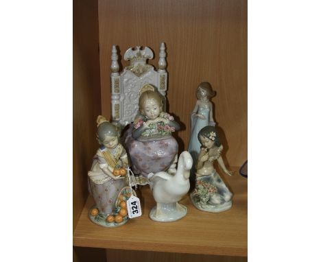 FOUR LLADRO FIGURES AND A NAO GOOSE, to include Spanish girl with oranges, height approximately 19cm, a larger figure of Span