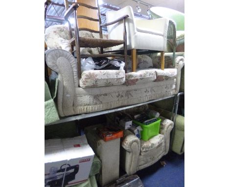 AN UPHOLSTERED THREE PIECE SUITE, comprising of a three seater settee, armchair and a pouffe (4)