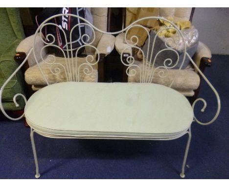 A METAL FRAMED TWO SEATER BENCH, with removable cushion
