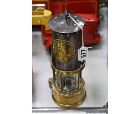 A BRASS MINERS LAMP, projector lamp and lighting Type SL, 83 Owners Eccles