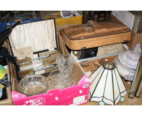 A SUITCASE, containing ladies handbags, cased deco style dressing table set, glassware, opaque deco style lamp shade, veined 
