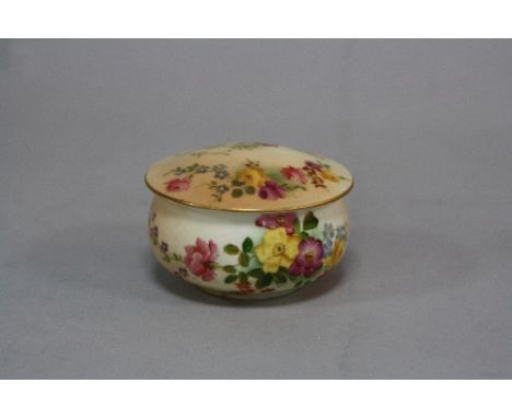 A ROYAL WORCESTER COVERED POT, florally decorated on blush ivory ground, puce backstamp, diameter approximately 7.5cm (restor