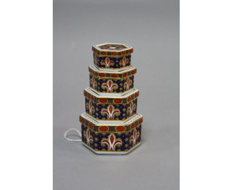 A SET OF FOUR MINIATURE GRADUATING ROYAL CROWN DERBY HEXAGONAL TRINKET POTS, A1297 (smallest lid a/f)