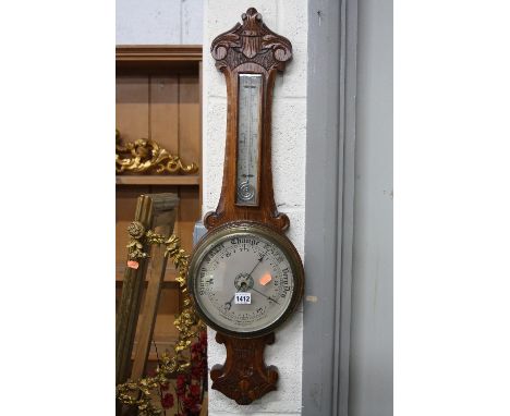 AN OAK CASED BAROMETER, the dial marked Chadburns Ltd Opticians, 47 Castle St, Liverpool