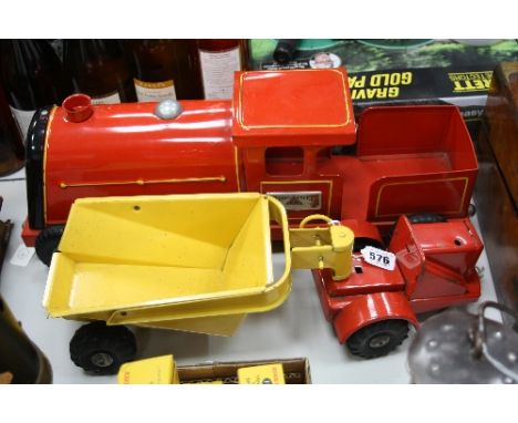 AN UNBOXED TRI-ANG PRESSED STEEL PULL-ALONG TRI-ANG EXPRESS LOCOMOTIVE, missing string and has some minor damage, with an unb